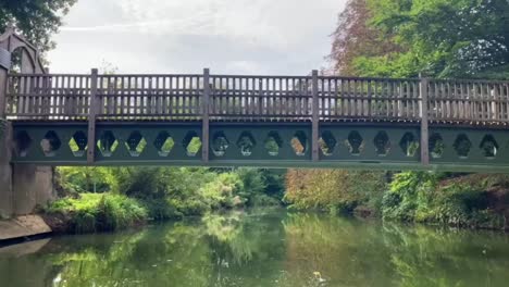 beautiful old historic foot bridge over river in oxfordshire nature