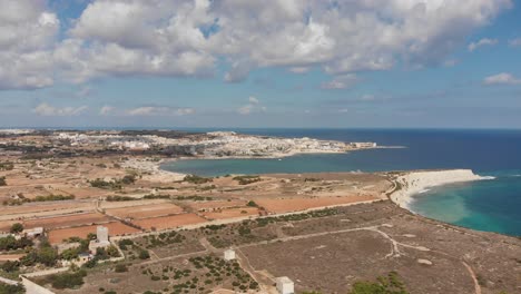 Aerial-drone-video-from-eastern-Malta,-Marsaxlokk-area,-Il-Hofra-l-Kbira-bay