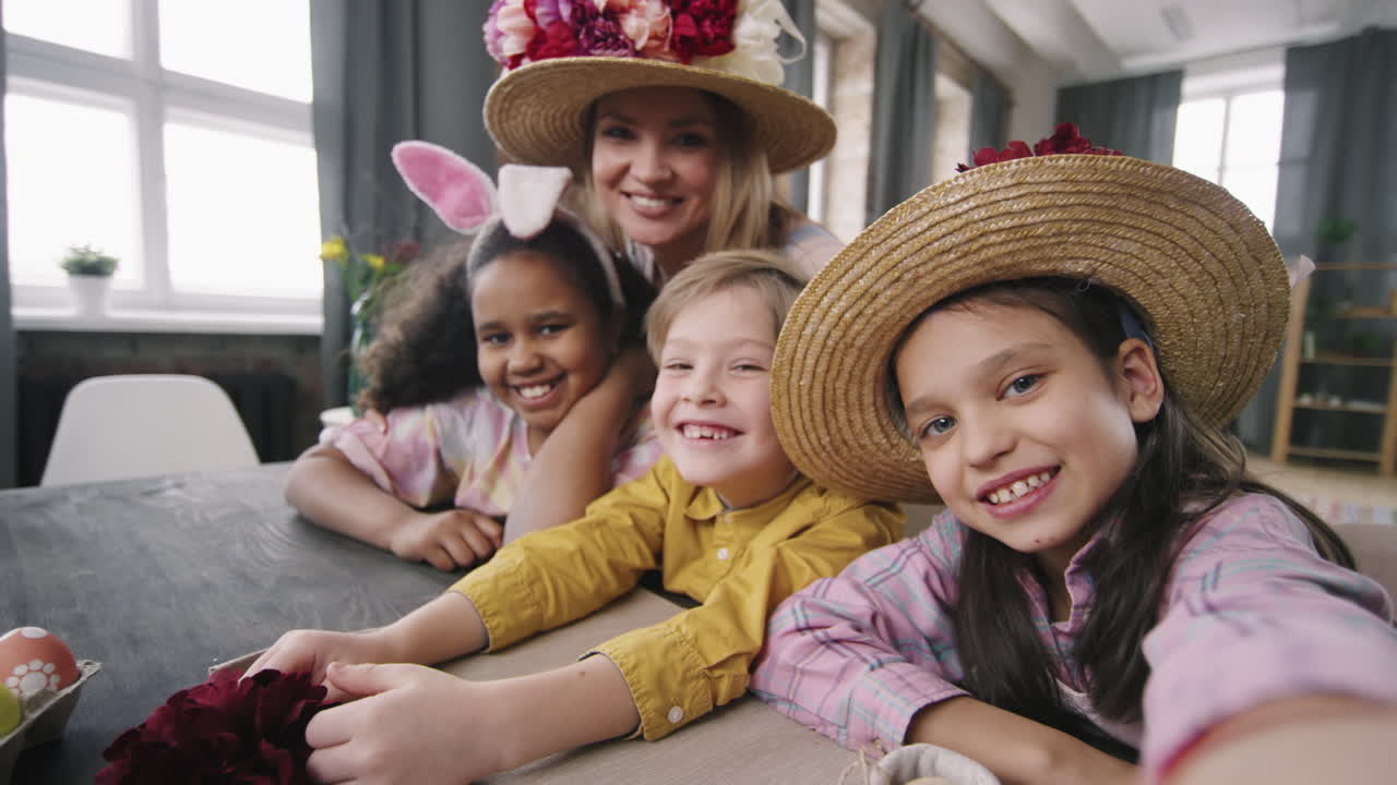 POV of Happy Children and Woman Posing in Easter Workshop