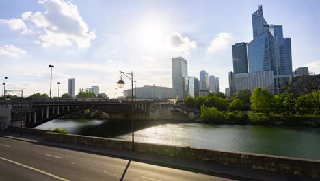 paris la defense, france, timelapse - the financial district of paris called la defense and the seine river during the day