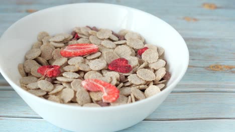 bowl of granola with dried strawberries