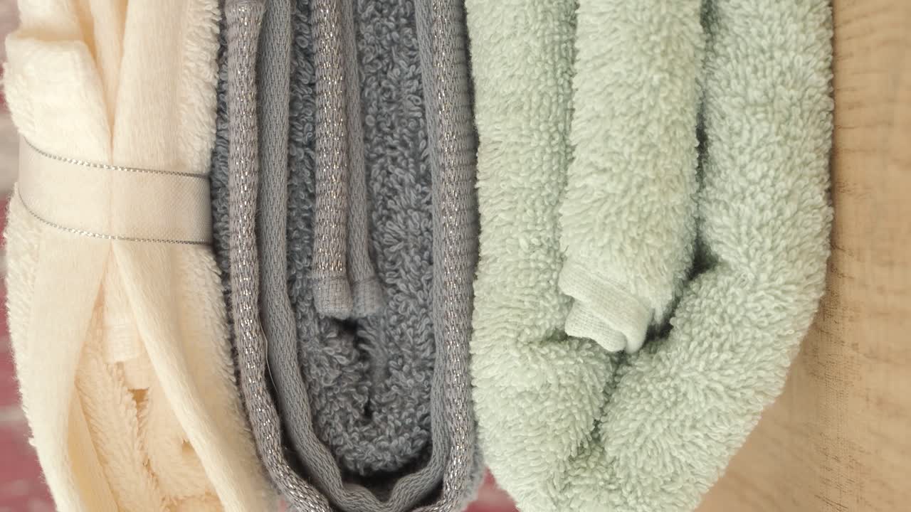 Neatly Folded Towels in Pastel Colors