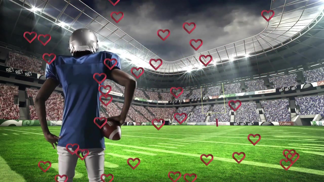 Giocatore di football americano in piedi sul campo con icone a forma di cuore fluttuanti