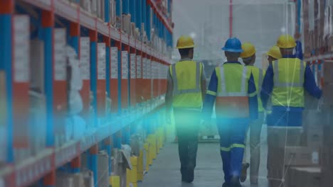 Workers-walking-through-warehouse-racks