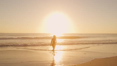 young woman by the sea