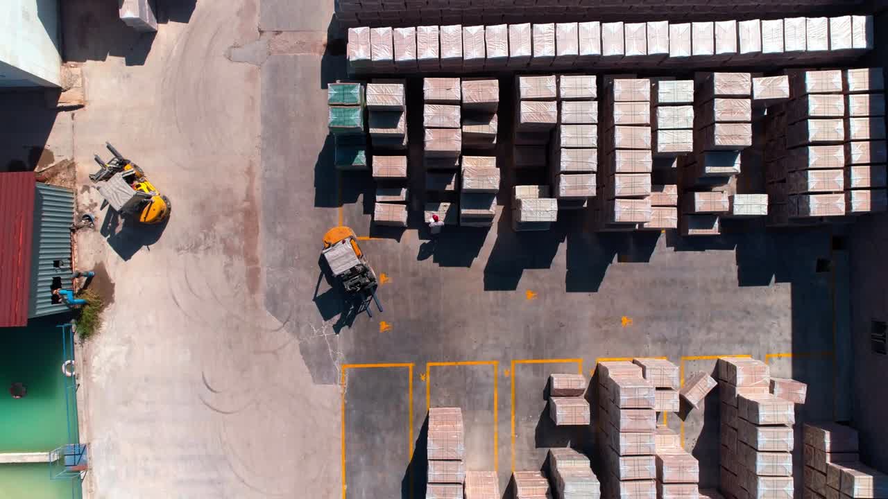 Aerial Top Down Piles of Ceramic Tiles Outside of Factory