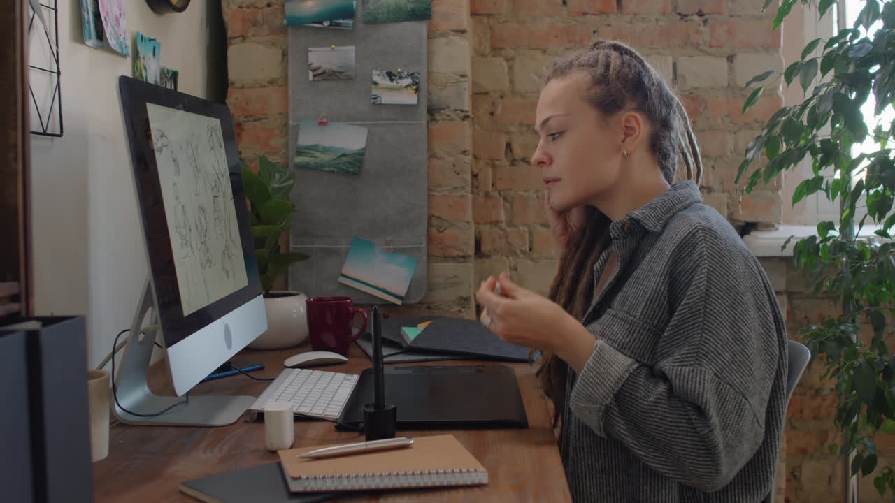 Graphic Designer Drawing While Listening To Music