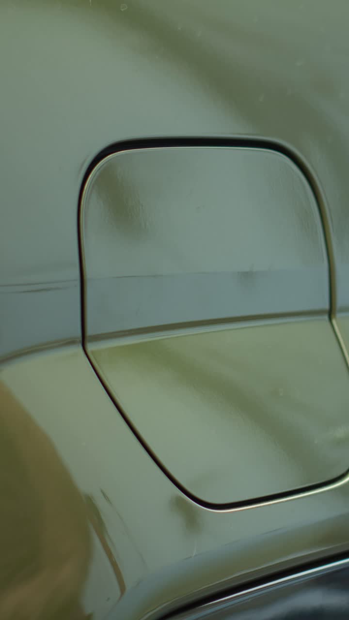 Vertical video Closeup of driver preparing to leave parking lot after recharging EV car