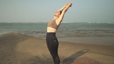 girl doing back bend stretch after practicing vinyasa yoga