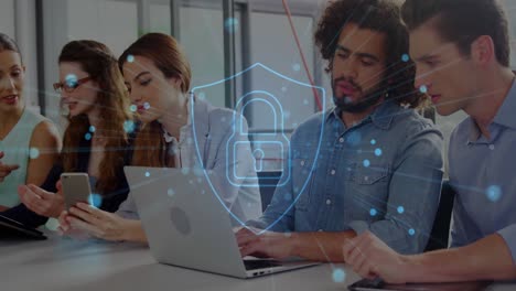 Security-padlock-icon-against-group-of-colleagues-working-in-office