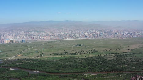 Rising-above,-Ulaanbaatar-from-the-mountains-at-Mongolia