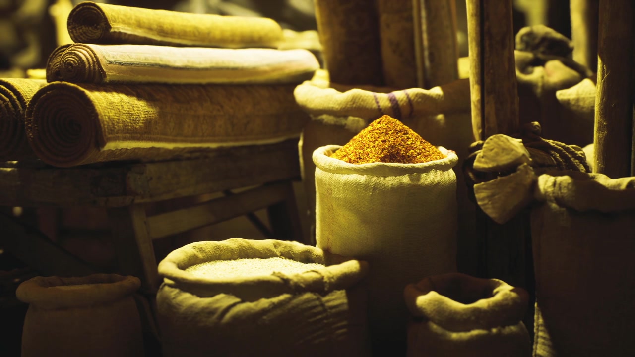 Oldfashioned spice stand with colorful aromatic ingredients on display