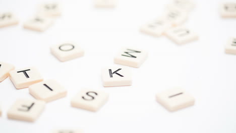 autism spelled out in letter pieces falling down