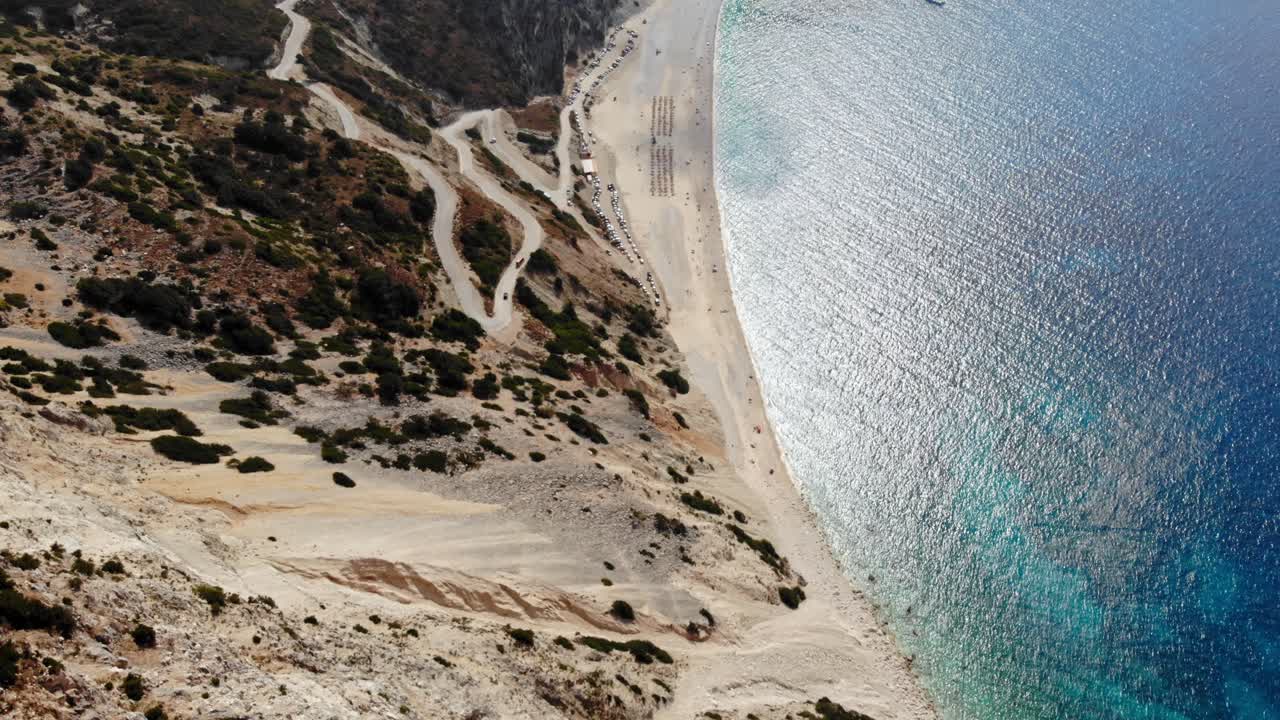 Top View of the Turquoise Colored Sea of the famous Myrtos Beach on the Greek Island of Kefalonia - aerial drone shot