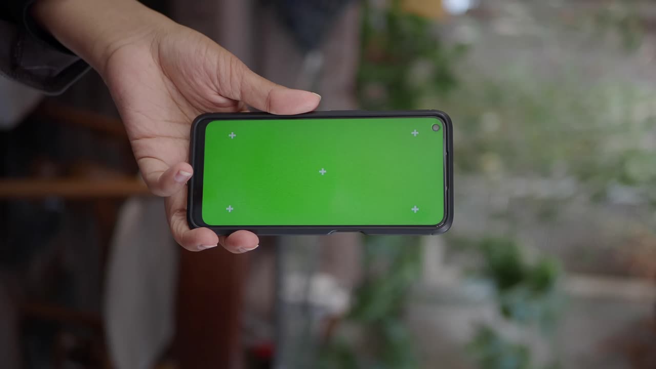 Smartphone con pantalla verde