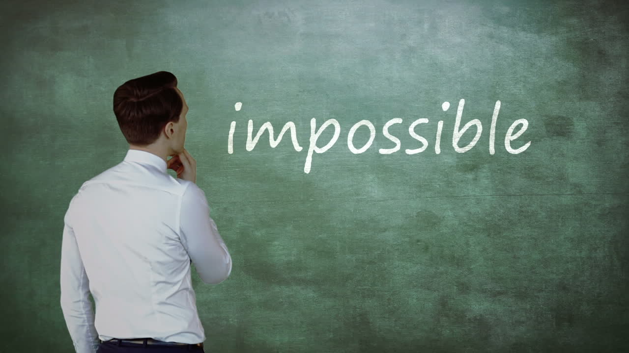 Thoughtful businessman looking at word