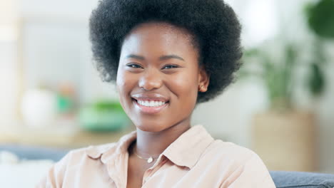 Happy-African-woman-with-an-afro-laughing