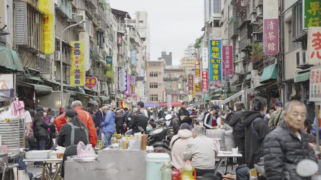 Lively Street Market at Xichang Street, Taipei: Authentic Local Vendors, Colorful Signs, and Bustling Shoppers in Taiwan