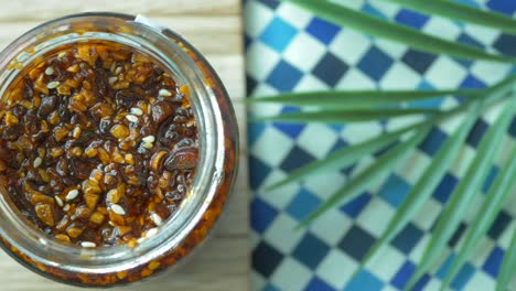 homemade chili oil with sesame seeds and garlic