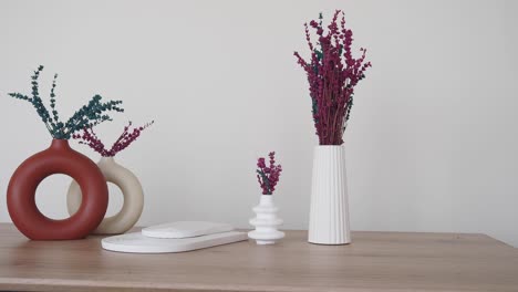 modern home decor with dried flowers in vases