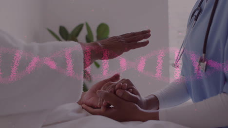 animación de una cadena de adn sobre una doctora biracial que sostiene las manos de su paciente