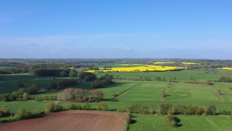 a drone flight over fields in spring