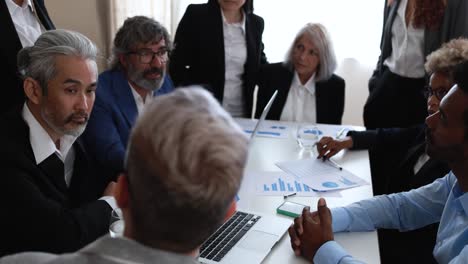 multiracial business people working inside bank office - meeting and startup concept