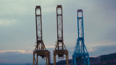 port cranes at dusk