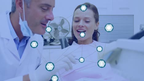 Animation-of-network-of-connections-with-icons-over-dentist-with-patient