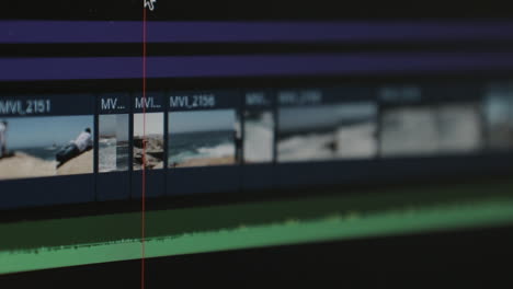 close up of video editing software with moving timeline and mouse movement