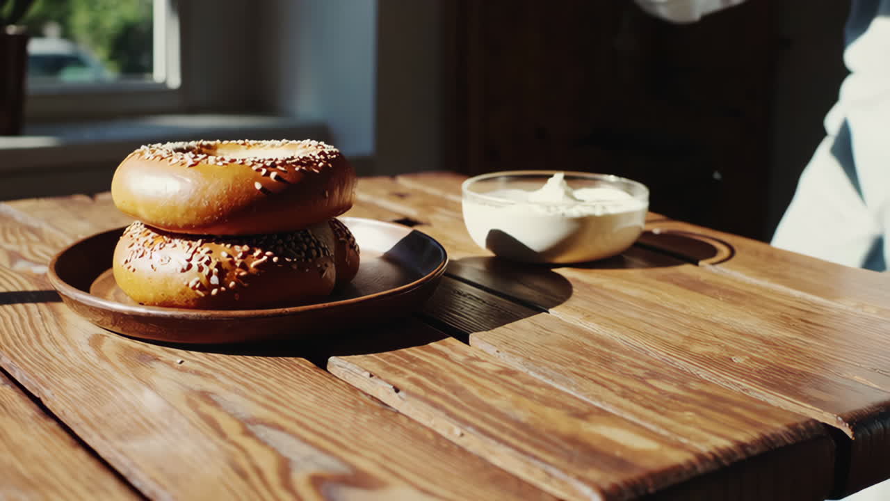 Preparing a Bagel with Butter