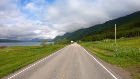 vehicle point-of-view driving a car on a road in norway