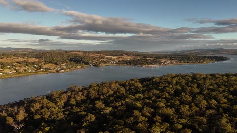 anchored boats on tamar river in tasmania during sunset time