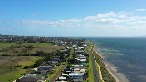 AERIAL-Australian-Esplanade-Road-Leading-Along-Scenic-Coastline