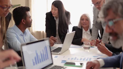 multiracial business people working together inside modern bank office - diverse multi generational conference