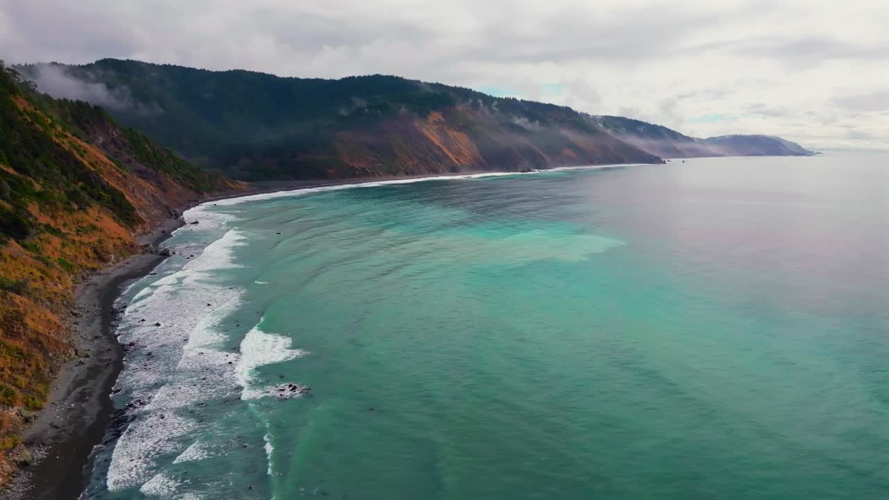 USAL Beach vibrant Pacific Ocean landscape scene Sinkyone Wilderness Lost Coast Trail California aerial drone rugged untouched coastline rain mist morning remote untouched waves crashing circle left