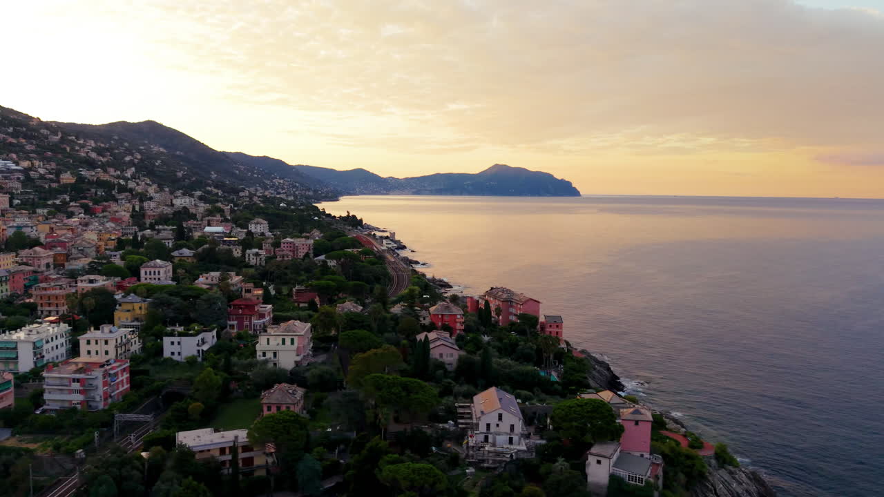 Sunset Aerial View of Colorful Genoa Italy, Calm Sea and Houses