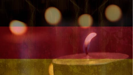 German-flag-with-candle-going-out