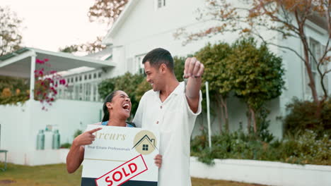 property, keys and a homeowner couple with a sold