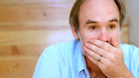 worried man sitting on stairs 4k