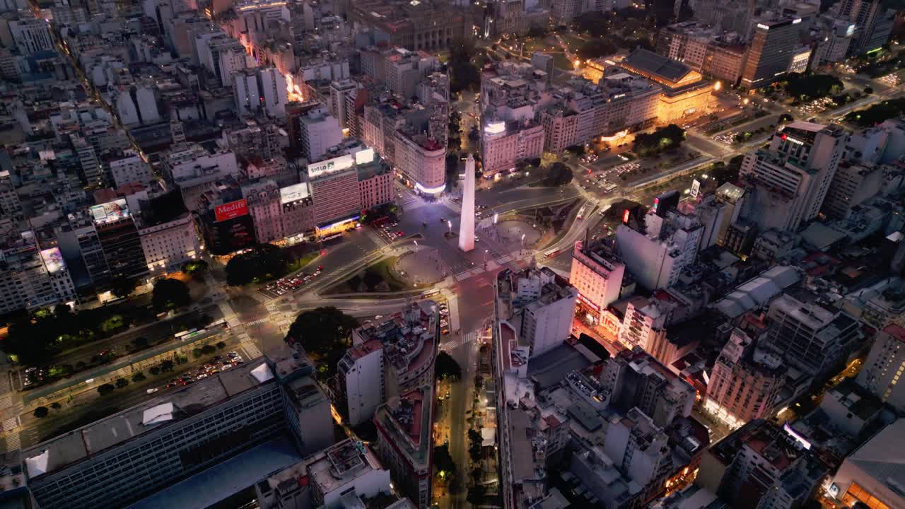 Aerial drone view at blue hour of the largest avenue in the world and the Obelisco in Buenos Aires, Argentina