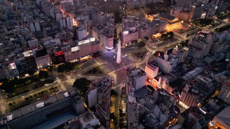 aerial drone view at blue hour of the largest avenue in the world and the obelisco in buenos aires, argentina