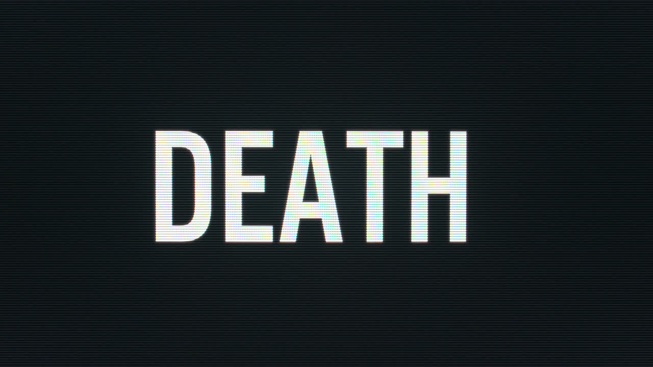 Closeup of Death being Typed onto Vintage Computer Monitor with Blinking Cursor