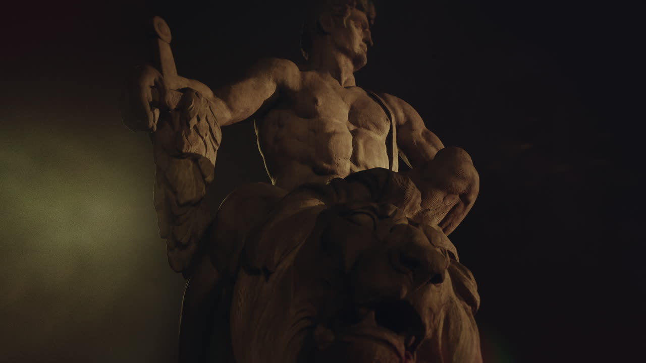 Epic, ancient stone statue at night