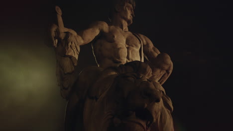 Epic, ancient stone statue at night