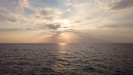 Beautiful-sunset-over-the-sea-with-light-waves