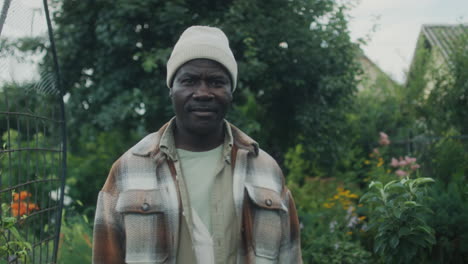a man standing in a garden