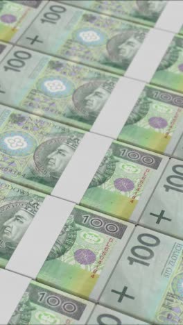 vertical video of 100 polish zloty banknotes printed by a money press