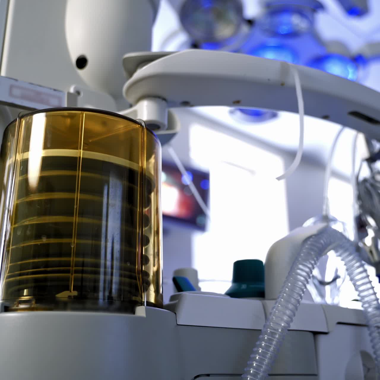 Medical apparatus for artificial lungs ventilation. Working process of pulmoflator on surgery background in hospital. Saving patient's life.