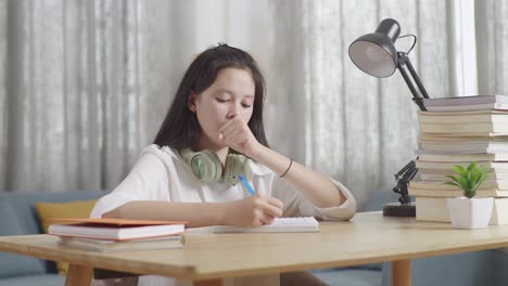 girl studying at home